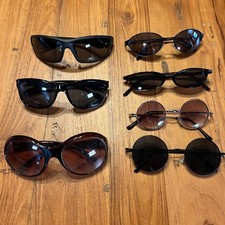 Mixed lot of 7 unbranded sunglasses, cats eye, Lennon specs, wrap-arounds, more
