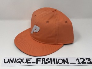 salmon pink hat