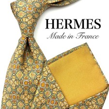 Excellent condition HERMES tie in yellow all over pattern plant flower