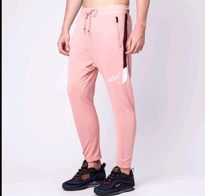 $85 NIKE AIR SPORTSWEAR NSW POLYKNIT TRACK PANTS RUST PINK sz M