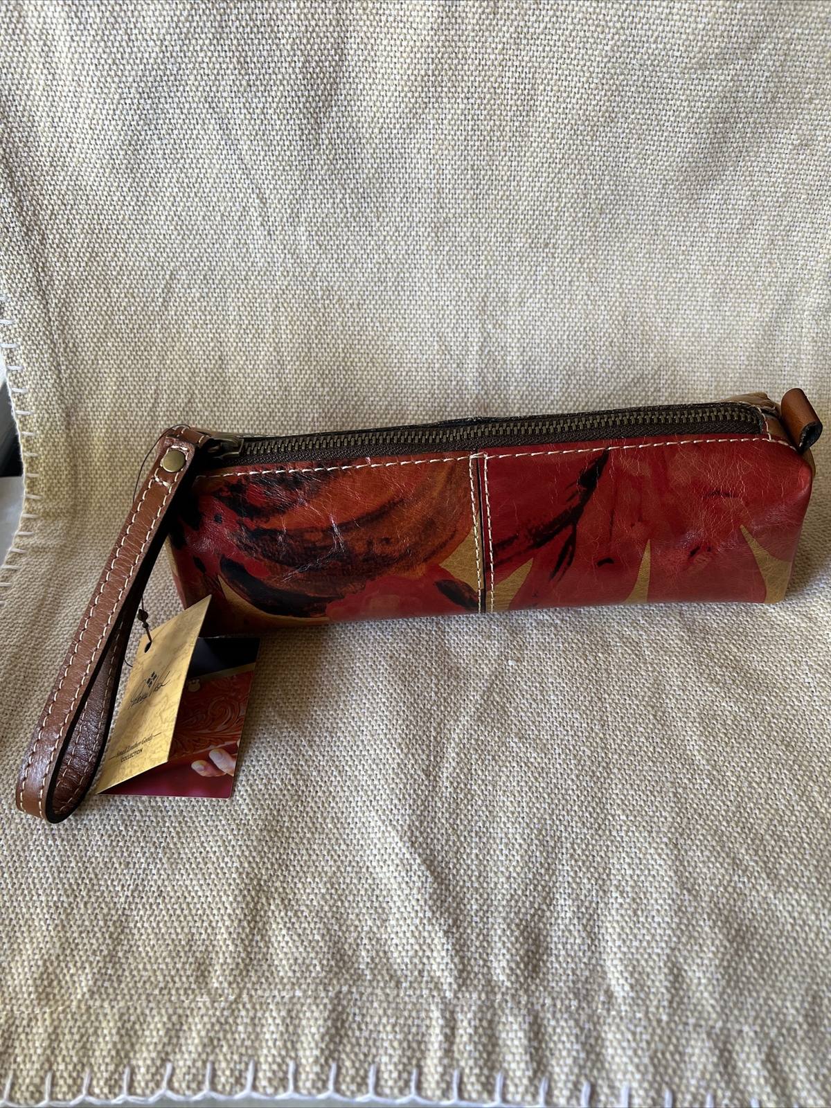 Estuche Muñequera PATRICIA NASH Isla Oblongo Cuero Italiano Nuevo con Etiquetas