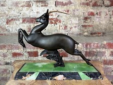 Impala en régule époque Art Déco socle en onyx et pierre dure signé ROCHARD
