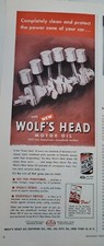 1952 Wolf"s Head Motor Oil clean protect power zone of car vintage ad