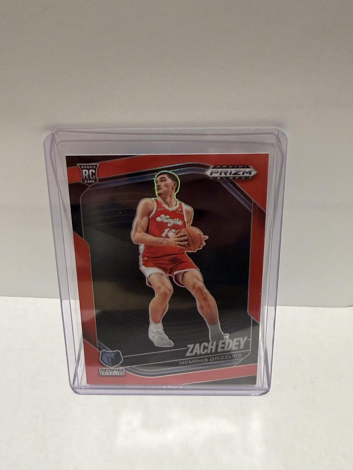 2024-25 Panini Prizm Black #64 Zach Edey Red #/299