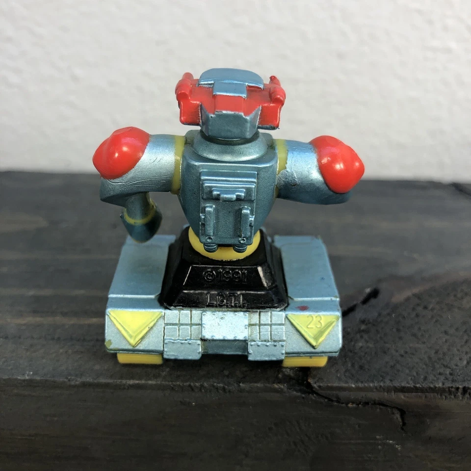 Bolsa de basura vintage ramo Plutor robot 2 pulgadas de alto LGTI Galoob robot de colección. Foto 2 de 4