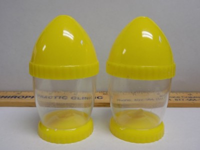 Vintage Bullet shaped Salt and Pepper Shakers Atomic Beautiful condition Yellow and clear plastic