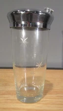 Vintage mid-century modern starburst glass cocktail shaker with chrome lid