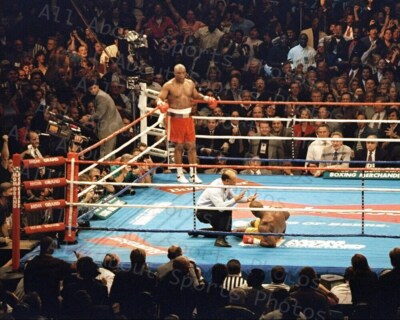 Michael Moorer Goes Down to George Foreman who becomes Champ Photo Print Poster