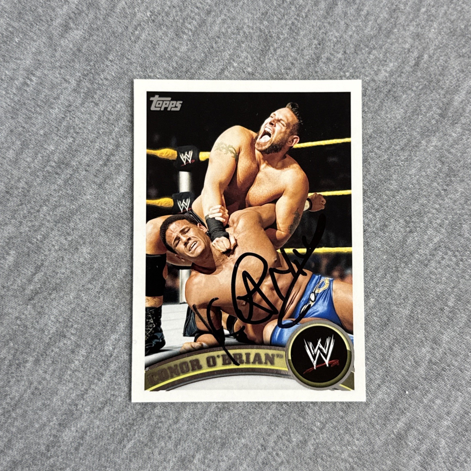 2011 Topps WWE #87 Conor O'Brian (RC) Signed IP Auto