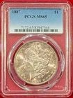 1887 MORGAN SILVER DOLLAR GRADED AN MS65 BY PCGS