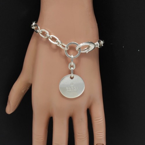 GUCCI TRADEMARK ENGRAVED .925 STERLING SILVER ROUND CHARM BRACELET. - Picture 9 of 9
