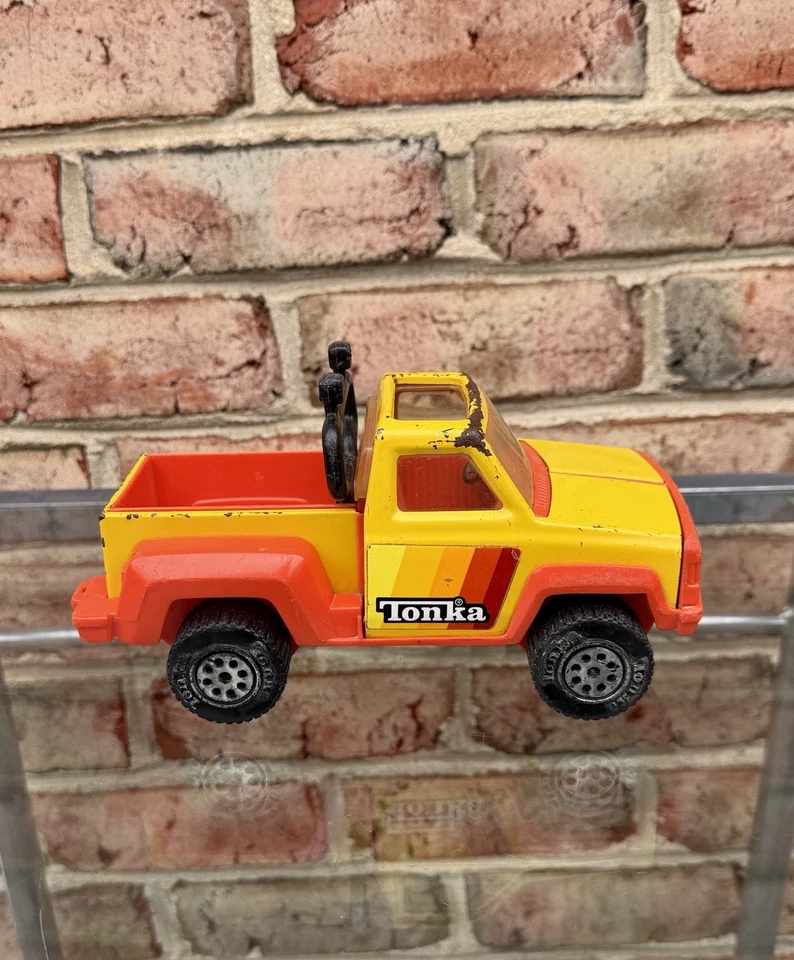 Camioneta pickup Tonka 1979 vintage 4x4 juguete de acero prensado naranja y amarillo 9" Foto 3 de 4