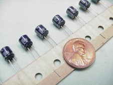  12 100 uF  10 VDC Low Profile Electrolytic Capacitors, Radial Leads