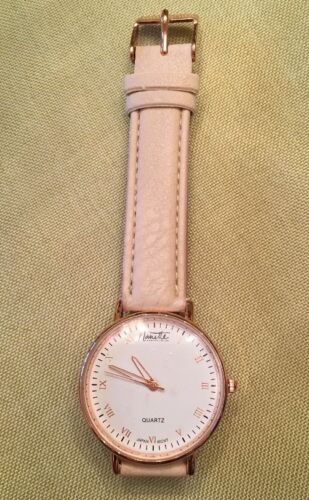 Nanette Lepore Classic Rose Gold Watch. NEW. Retails for $55. Includes Dustbag