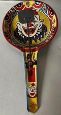 Vintage US Metal Toy Mfg Co Tin Noise Maker Fun Deep Pan Rattle Clown Blue Back