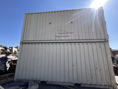 2 used 20-foot standard-height steel shipping/storage contain (sold Separately)
