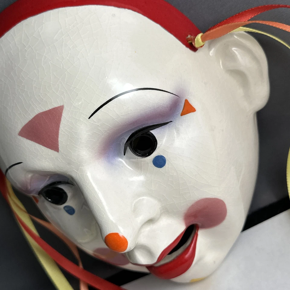sobre cara arcilla arte máscara con pegatina Foto 3 de 4