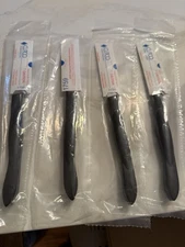 Set of 4  CUTCO 1759 Serrated Steak Knives w/ Plastic Holders!