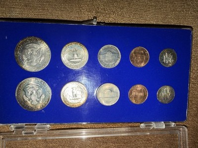 Two mint sets, 1964 and 1963, both Philadelphia and Denver both in
