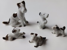Estatuillas de porcelana vintage miniatura de perro terrier con cachorros