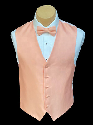 peach vest and tie