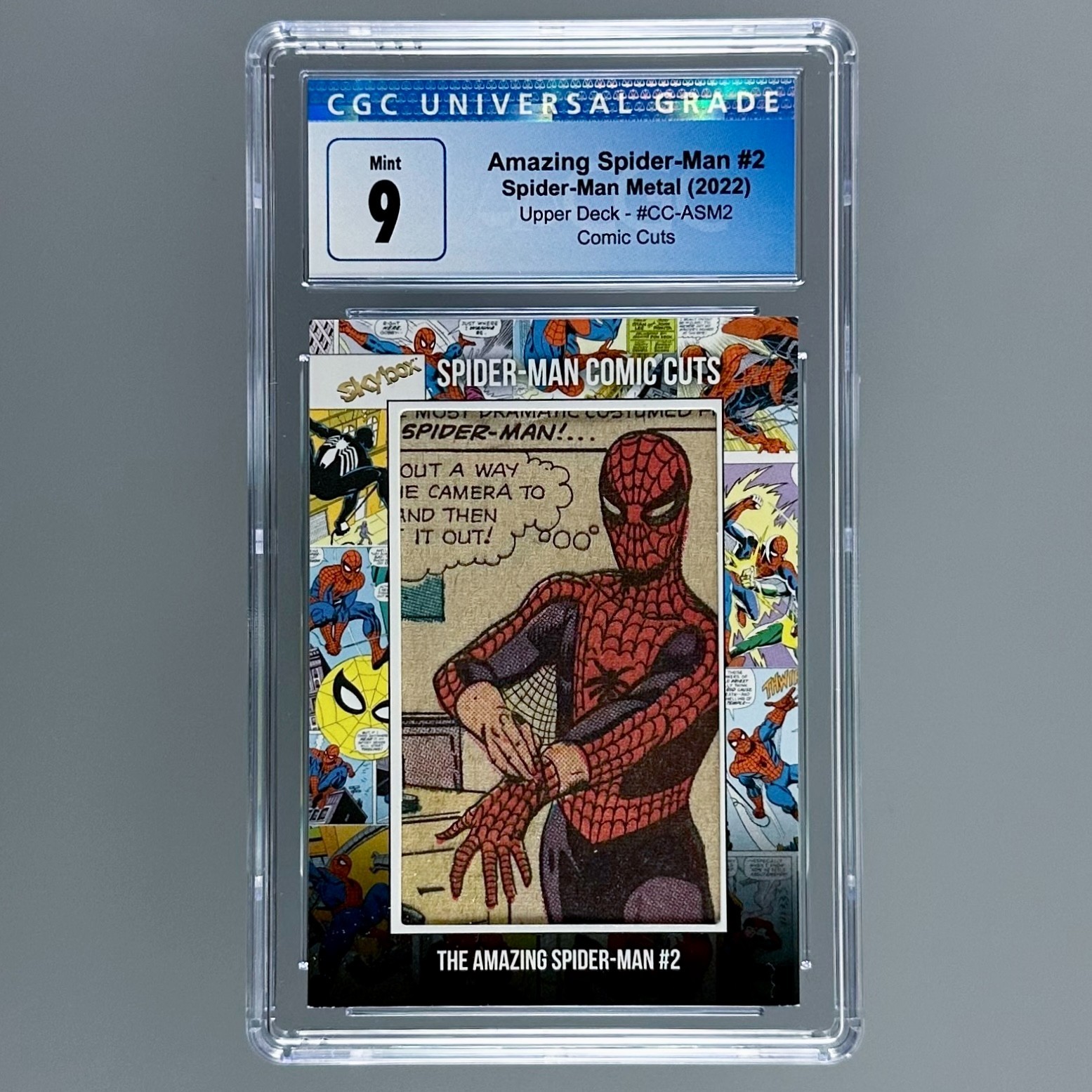 Amazing Spider-Man #CC-ASM51 Marvel 2022 Metal Universe Spider-Man Comic Cuts trading card — raw and PSA graded price guide