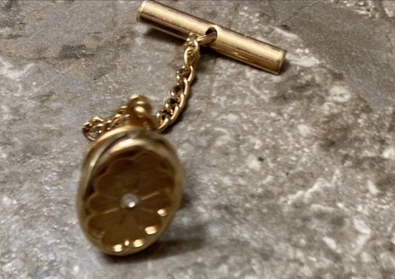 Vintage men's tie tack pin with a safety chain and buttonhole bar