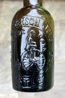 VINTAGE c1900s EMMERSON JUNr NEWCASTLE BICYCLE PICT BLACK GLASS BEER BOTTLE