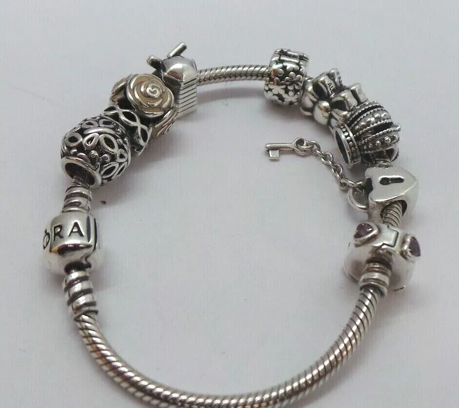 AUTHENTIC SILVER PANDORA CHARM BRACELET W 9 CHARMS 7