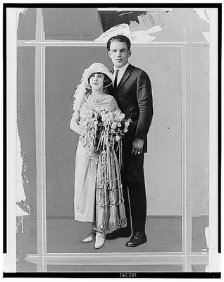 Edward & Celia Cooney taken on their wedding day,1924,groom,bride,flowers