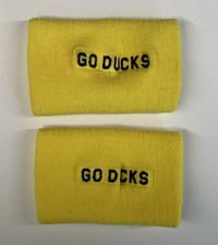 OREGON DUCKS "GO DUCKS" FOOTBALL TEAM ISSUE YELLOW NIKE WRISTBANDS DOUBLE-WIDE