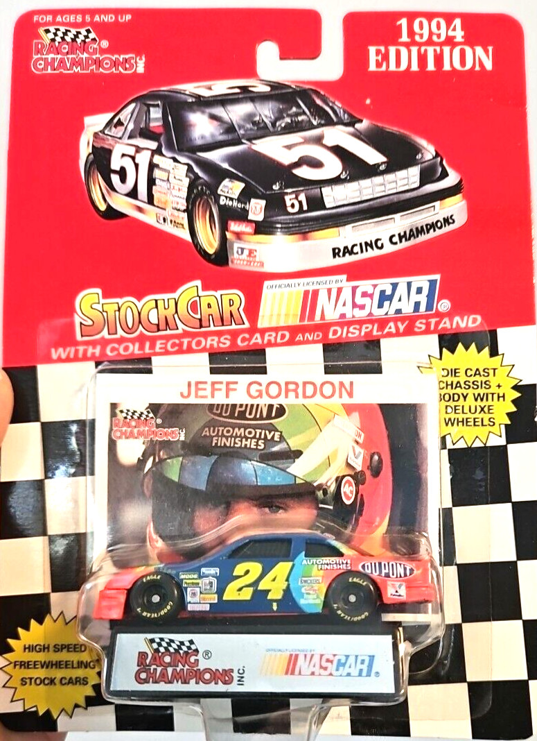 Racing Champions 1994 Jeff Gordon DuPont Stock Car in pack collectors card stand