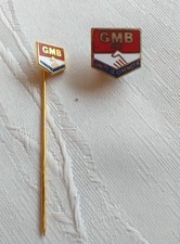 Two GMB (General, Municipal, Boilermakers) trade union enamel badges