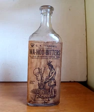 C.K.WILSON'S WAHOO BITTERS TOLEDO WRAP AROUND LABEL 1920s BOTTLE WITH INDIAN