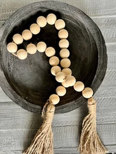 Santa Barbara Design Hand Carved Paulownia Wood Bowl & Wooden Bead Garland Decor