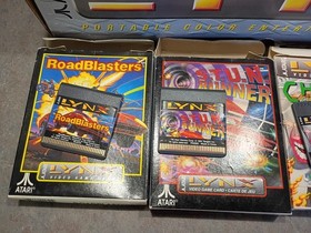 Atari LYNX Portable gaming video system + games in box parts repair