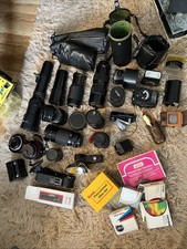Assorted Film Camera Lenses and Accessories