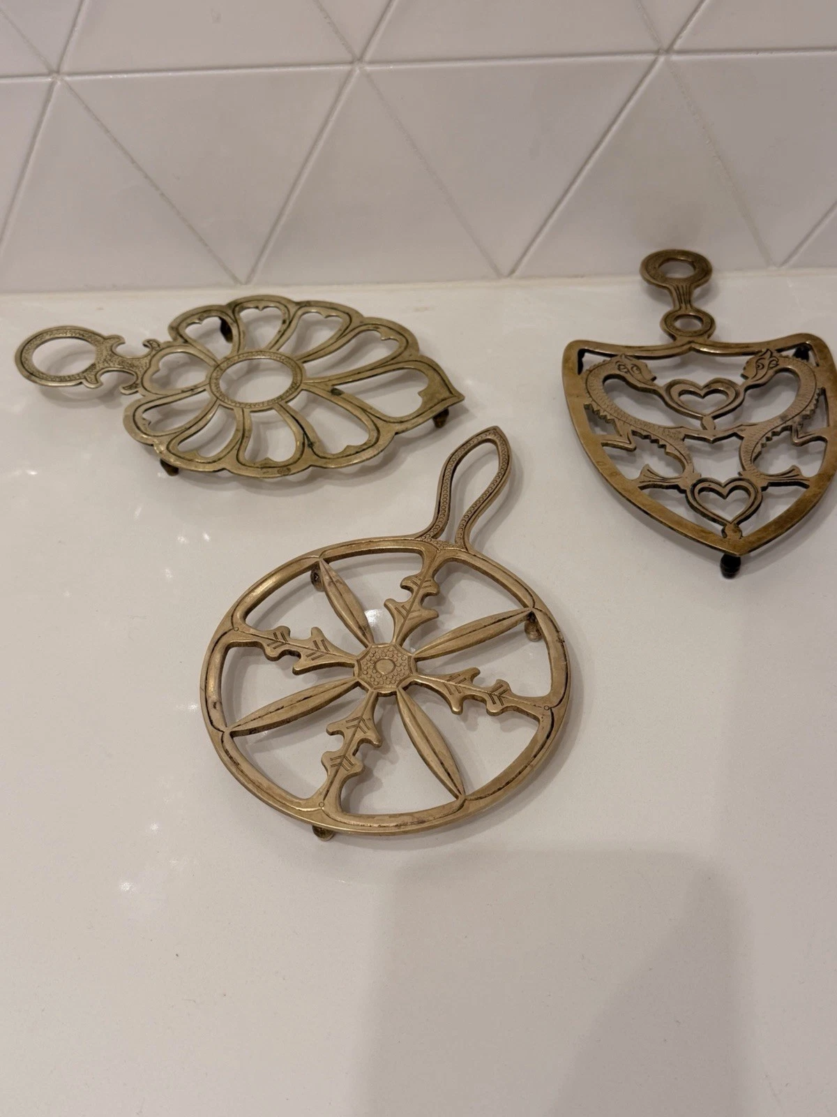 Vintage Brass Trivet Lot of 3 Heart Dragon Floral Round Footed Kitchen Decor image 1