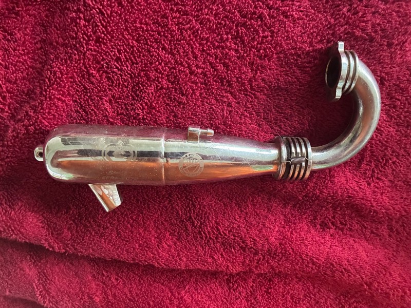Lightly used Go Racing Engine   tuned pipe and header for nitro buggy and truggy