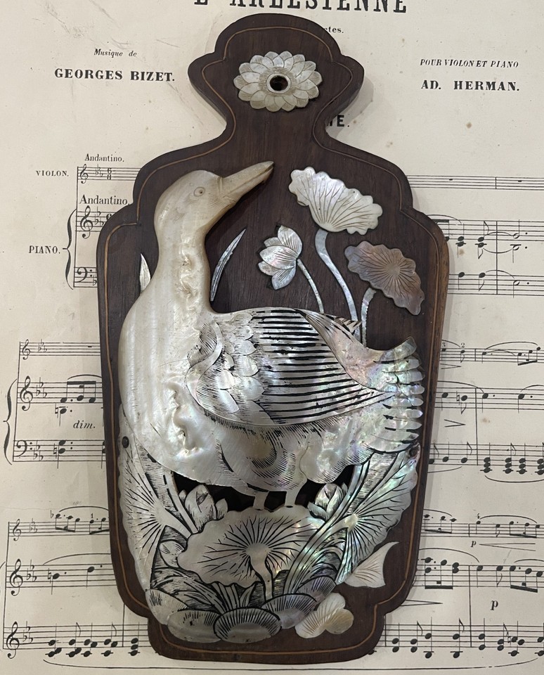 A 1920s French mother-of-pearl duck fan holder is the kind of bizarre, exquisite objet d'art that stops every single visitor dead in their tracks.