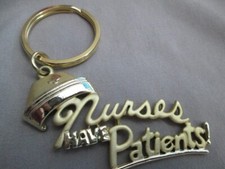 NURSES HAVE PATIENTS GOLD TONE KEYCHAIN