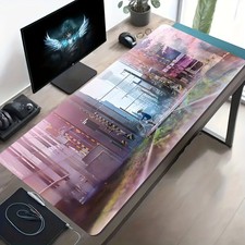 A Large Electronic Sports Gaming Mouse Pad Featuring a Scene of a Girl Riding o