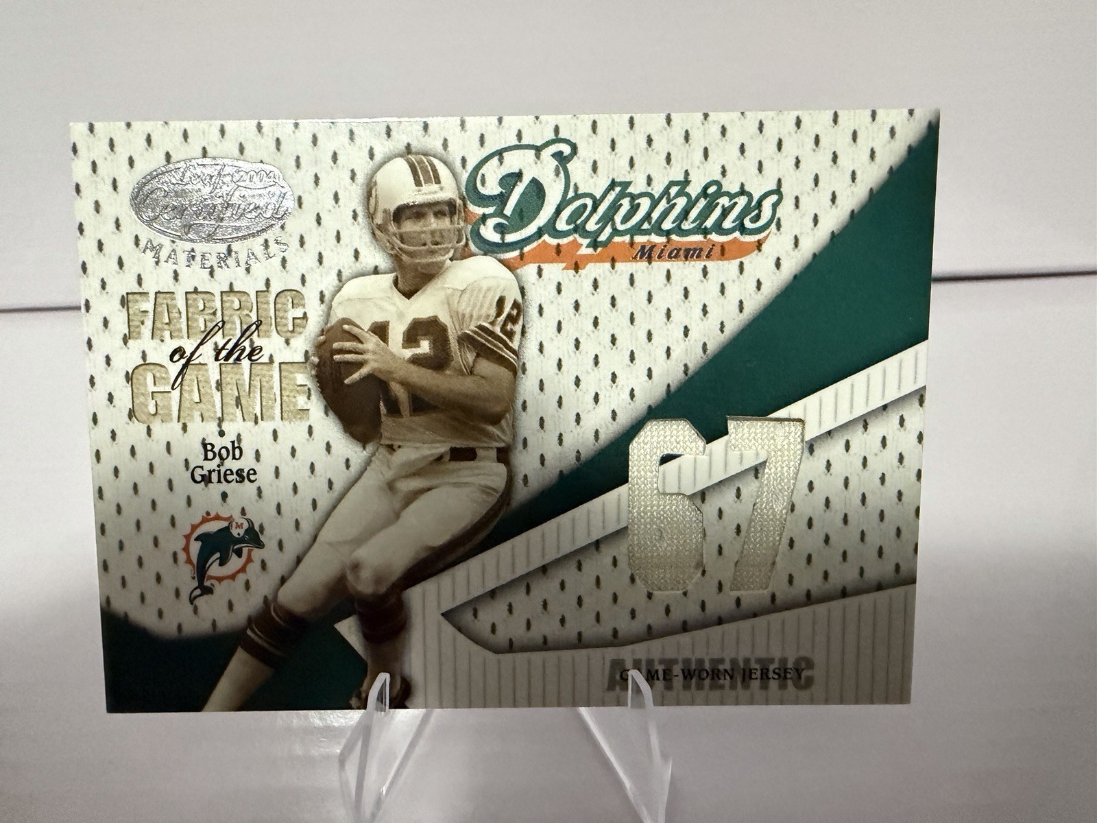 Bob Griese (RC) PSA7 , 3-game worn patches numbered /49,/100, /67, and auto /99 view 9