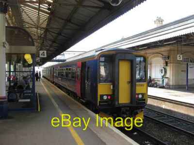 Photo 6x4 Platform 4, Exeter St Davids Paignton bound train about to depa c2011