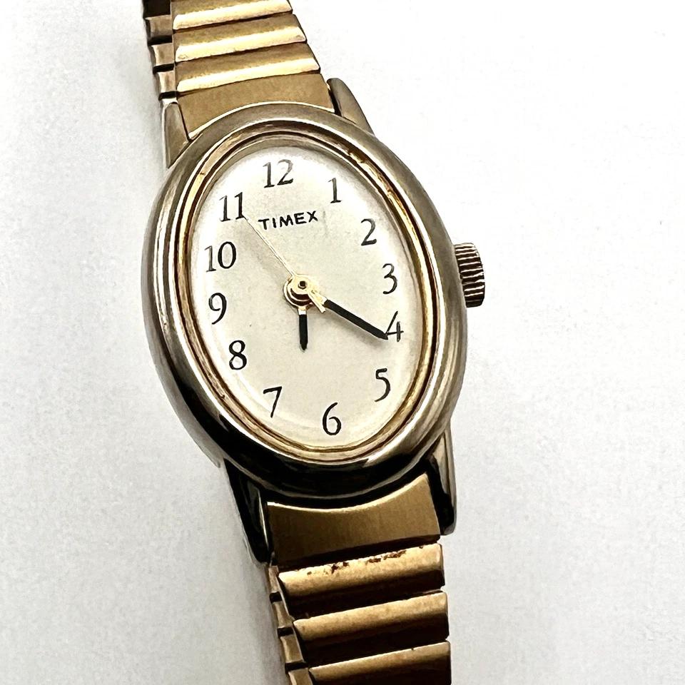 Reloj Timex Vintage Mujer Tono Dorado Funcionamiento Elastizado Correa Ajustada COMO ESTÁ Foto 2 de 4