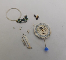 PUW 241 QUARTZ DATE MOVEMENT FOR PARTS or REPAIR. COIL MISSING. USED