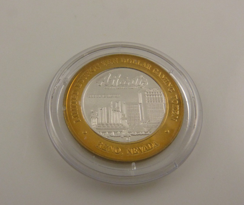 Atlantis Reno NV  .999 silver strike 10 dollar gaming token 1999 Skyway grand op