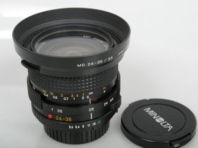 Minolta MD ZOOM 24-35mm 1:3,5 TOP + minolta Gegenlichtbl. MD 24-35 Hood n. mint