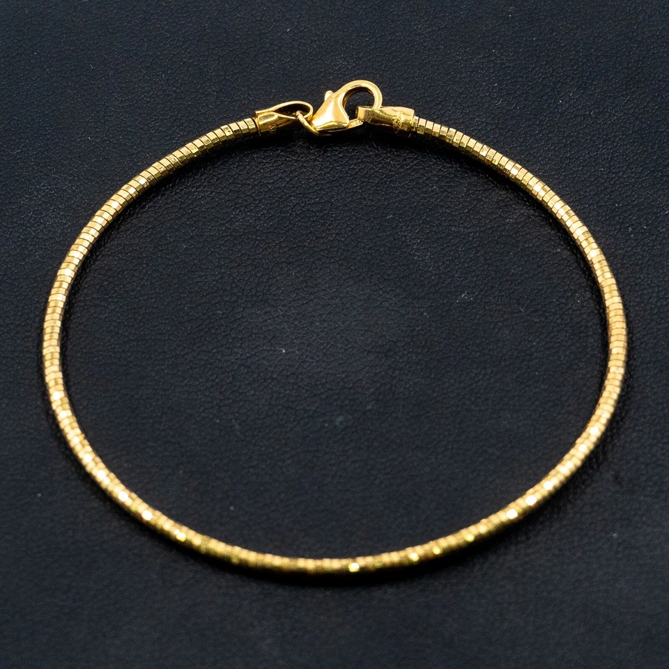 Brazalete redondo de oro amarillo de 18k Foto 4 de 4
