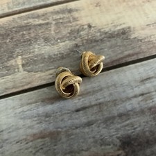 Vintage pierced textured gold tone knot stud earrings